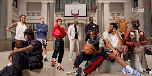 A group of kids with Michael Jordan  A group of kids with Michael Jordan