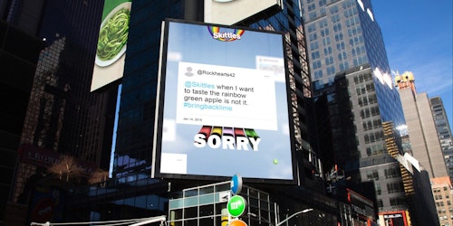 A Times Square billboard with a Skitttles ad apologizing to angry fans  A Times Square billboard with a Skitttles ad apologizing to angry fans