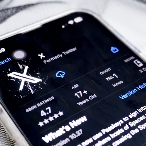 X app display in app store on mobile phone screen X app display in app store on mobile phone screen